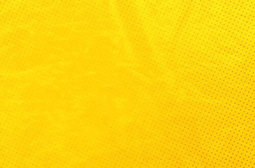 Retro Glow: Vintage Halftone Yellow Wallpaper